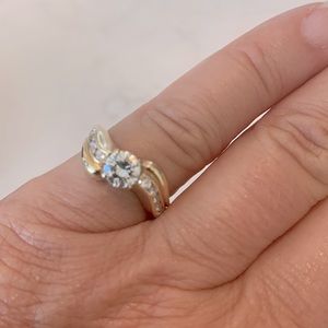 Stunning Diamond engagement or wedding band with 1/2 ct.center stone and bezels.